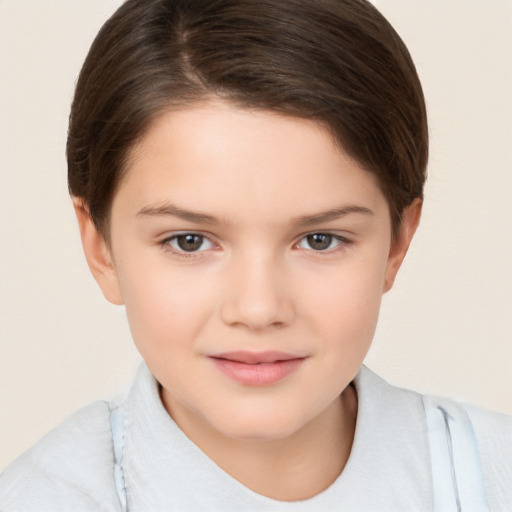 Joyful white child female with short  brown hair and brown eyes