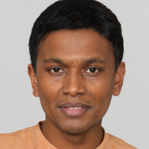 Neutral black young-adult male with short  black hair and brown eyes