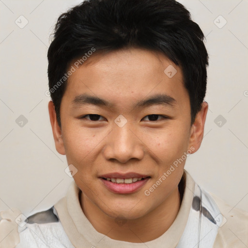 Joyful asian young-adult male with short  brown hair and brown eyes