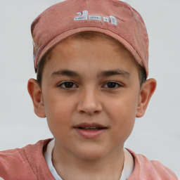 Joyful white child female with short  brown hair and brown eyes