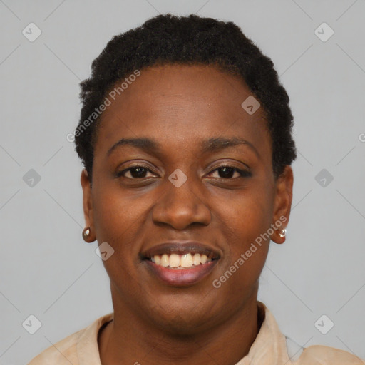 Joyful black young-adult female with short  black hair and brown eyes