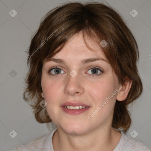 Joyful white young-adult female with medium  brown hair and blue eyes