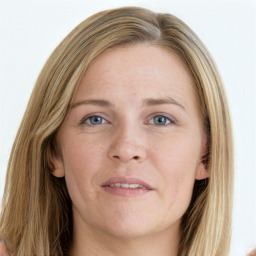 Joyful white young-adult female with long  brown hair and blue eyes