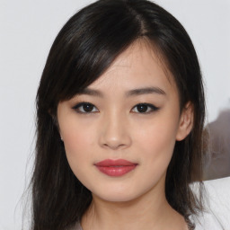 Neutral asian young-adult female with medium  brown hair and brown eyes