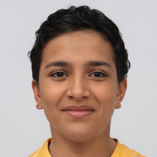 Joyful latino young-adult female with short  brown hair and brown eyes