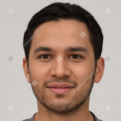 Joyful white young-adult male with short  black hair and brown eyes