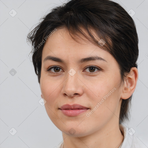 Joyful white young-adult female with medium  brown hair and brown eyes