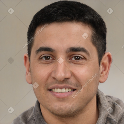 Joyful white young-adult male with short  black hair and brown eyes