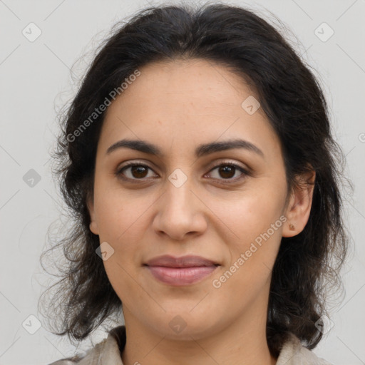 Joyful latino young-adult female with medium  brown hair and brown eyes