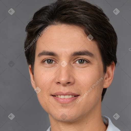 Joyful white young-adult male with short  brown hair and brown eyes