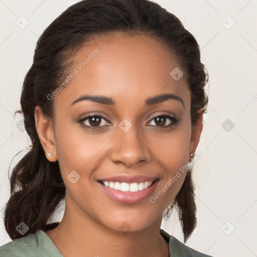 Joyful latino young-adult female with long  brown hair and brown eyes