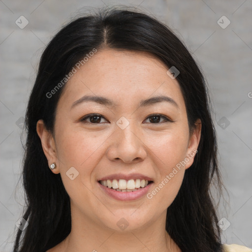 Joyful white adult female with medium  brown hair and brown eyes