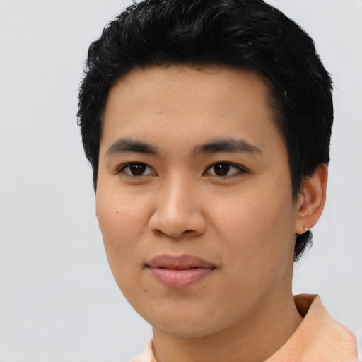 Joyful asian young-adult male with short  black hair and brown eyes
