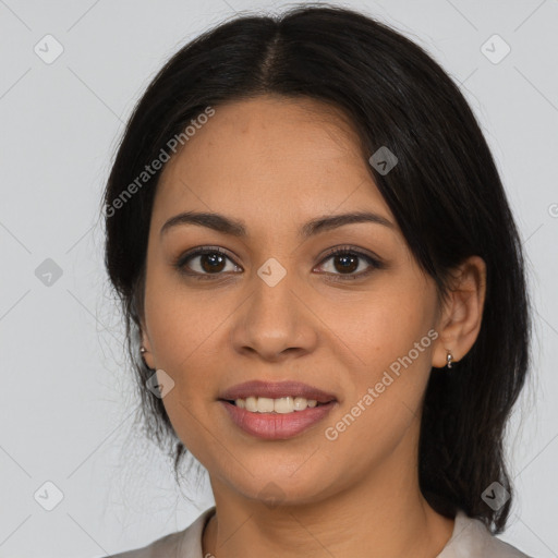 Joyful latino young-adult female with medium  black hair and brown eyes