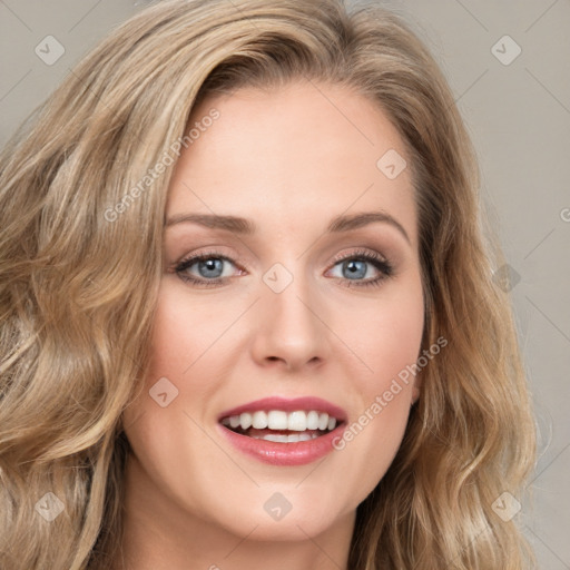 Joyful white young-adult female with long  brown hair and green eyes