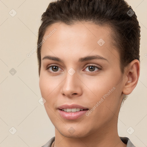 Joyful white young-adult female with short  brown hair and brown eyes