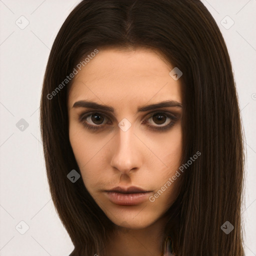 Neutral white young-adult female with long  brown hair and brown eyes