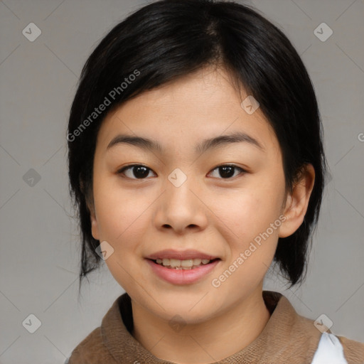 Joyful asian young-adult female with medium  black hair and brown eyes