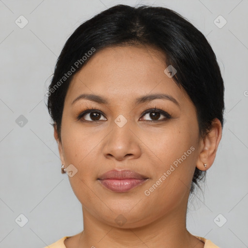 Joyful latino young-adult female with short  brown hair and brown eyes