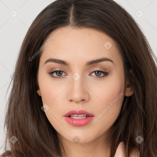 Neutral white young-adult female with long  brown hair and brown eyes