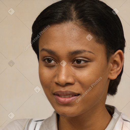 Joyful latino young-adult female with short  brown hair and brown eyes