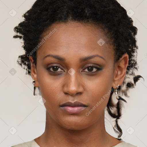 Neutral black young-adult female with short  brown hair and brown eyes