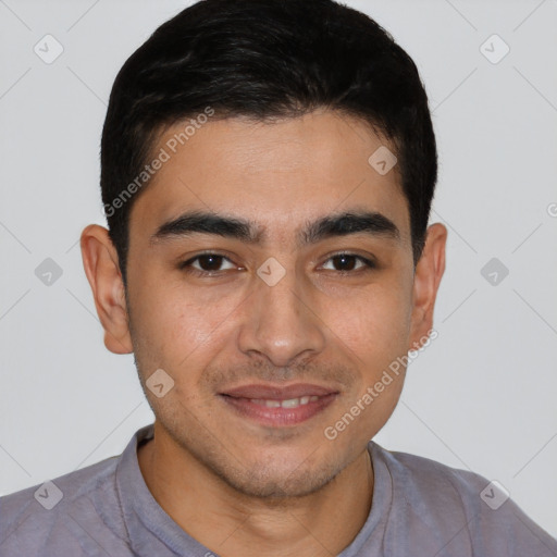 Joyful latino young-adult male with short  brown hair and brown eyes