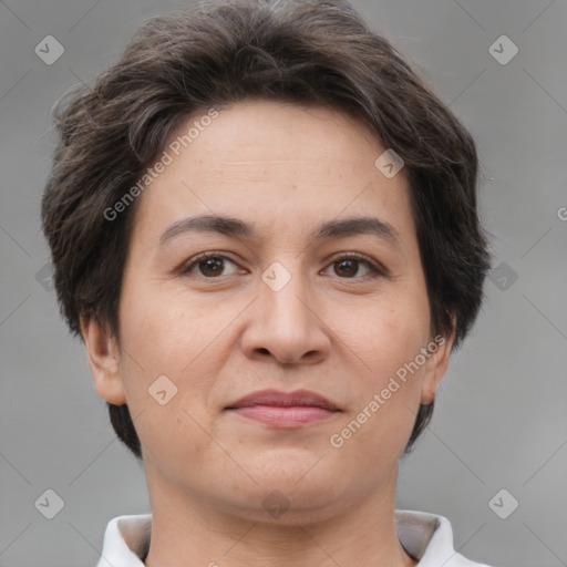 Joyful white adult female with short  brown hair and brown eyes