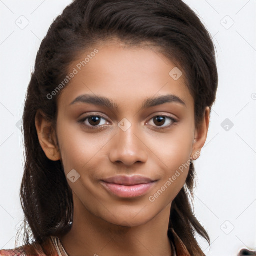 Joyful latino young-adult female with long  brown hair and brown eyes