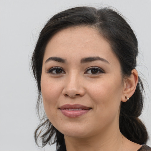 Joyful white young-adult female with medium  brown hair and brown eyes