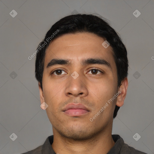 Neutral latino young-adult male with short  black hair and brown eyes