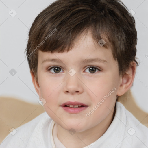 Joyful white child male with short  brown hair and brown eyes