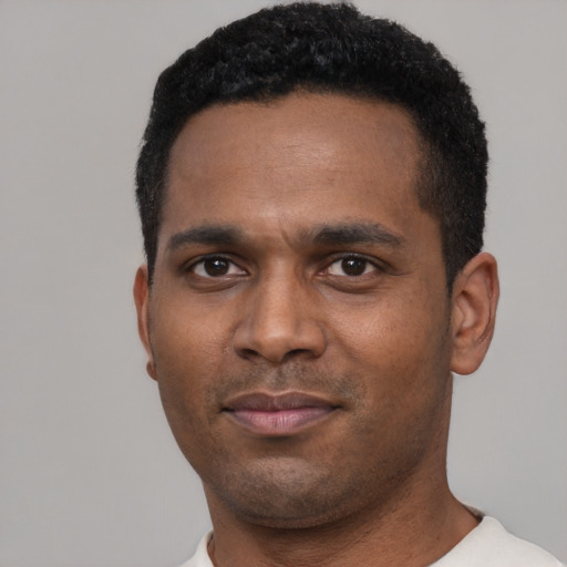 Neutral black young-adult male with short  black hair and brown eyes