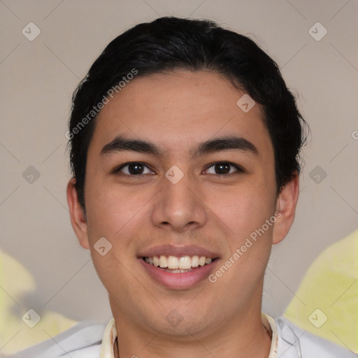 Joyful latino young-adult male with short  brown hair and brown eyes