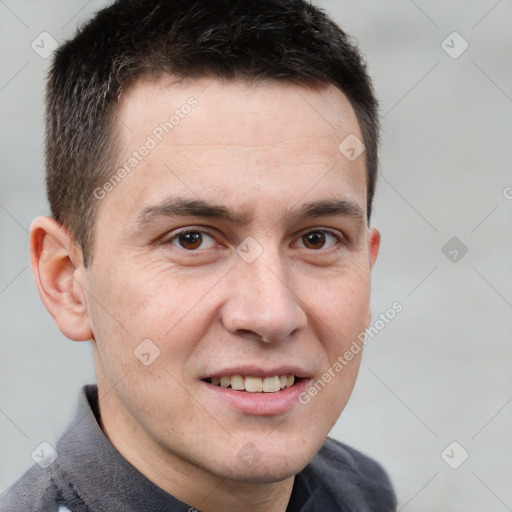 Joyful white adult male with short  brown hair and brown eyes