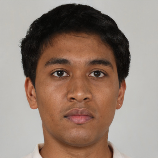 Neutral asian young-adult male with short  brown hair and brown eyes