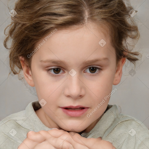 Joyful white child female with short  brown hair and brown eyes