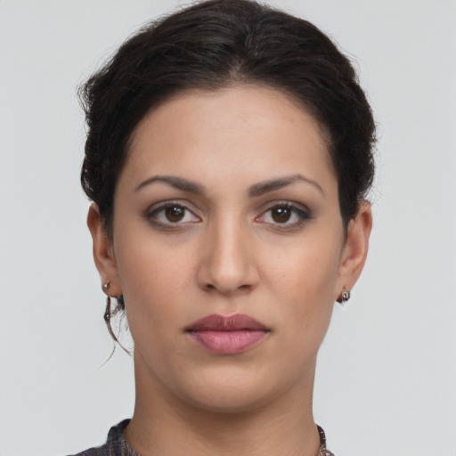 Neutral white young-adult female with short  brown hair and brown eyes