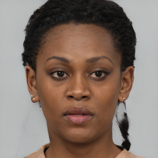 Neutral black young-adult female with short  black hair and brown eyes