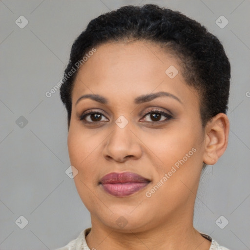 Joyful latino young-adult female with short  brown hair and brown eyes