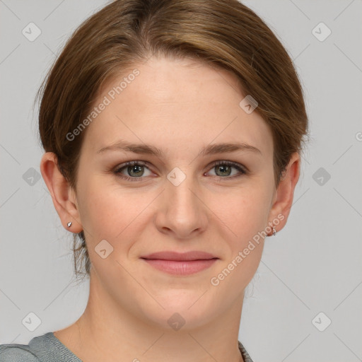 Joyful white young-adult female with medium  brown hair and grey eyes