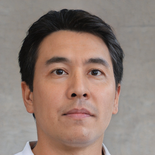 Neutral asian young-adult male with short  brown hair and brown eyes