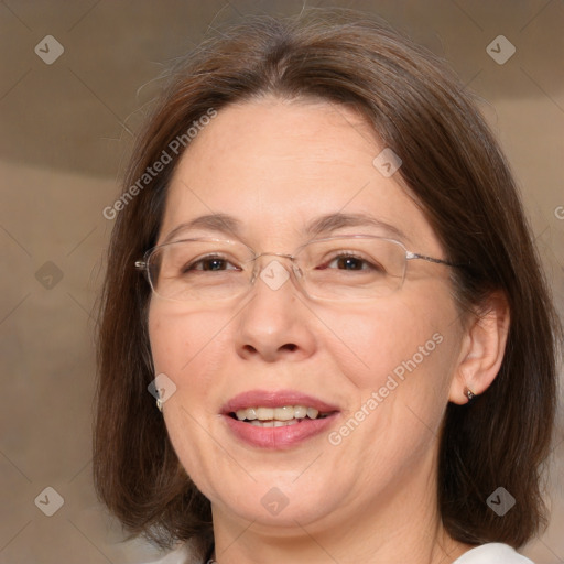 Joyful white adult female with medium  brown hair and brown eyes