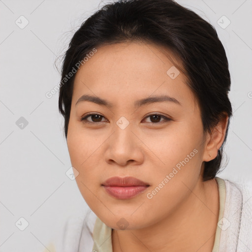 Joyful asian young-adult female with medium  brown hair and brown eyes