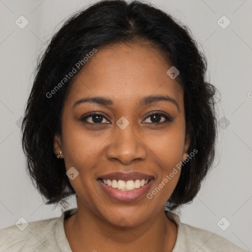 Joyful black young-adult female with medium  brown hair and brown eyes