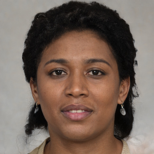 Neutral black young-adult female with short  black hair and brown eyes