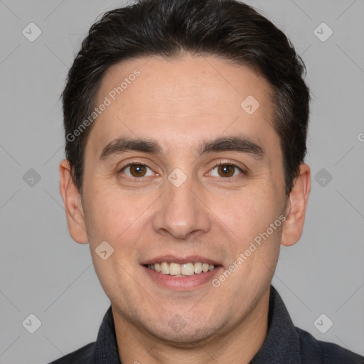 Joyful white adult male with short  brown hair and brown eyes