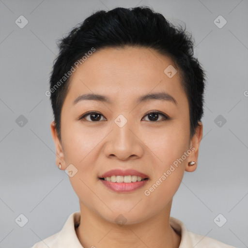 Joyful asian young-adult female with short  black hair and brown eyes