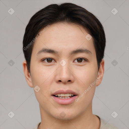 Joyful asian young-adult male with short  brown hair and brown eyes