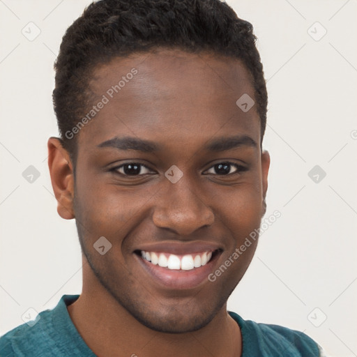 Joyful black young-adult male with short  brown hair and brown eyes